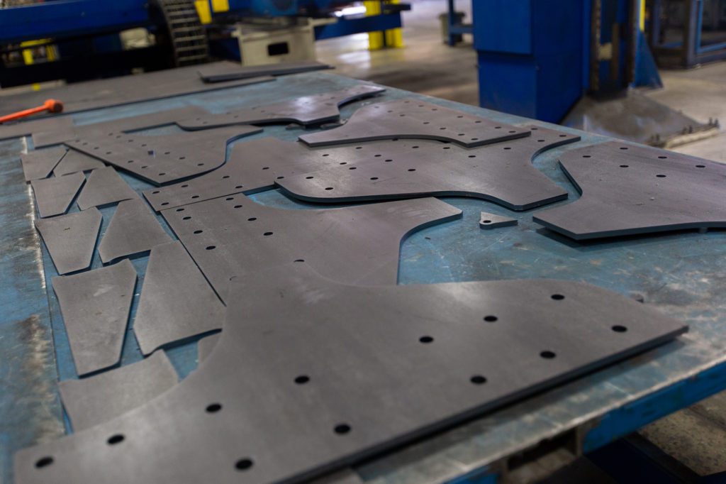 cut pieces of metal collected on a work station
